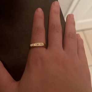 Elegant Gold Ring with Diamond Accents